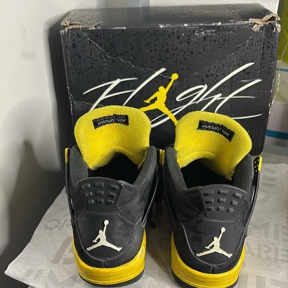 Black and YellowJordan 4’sSize 4.5 Boys USBox included upon request